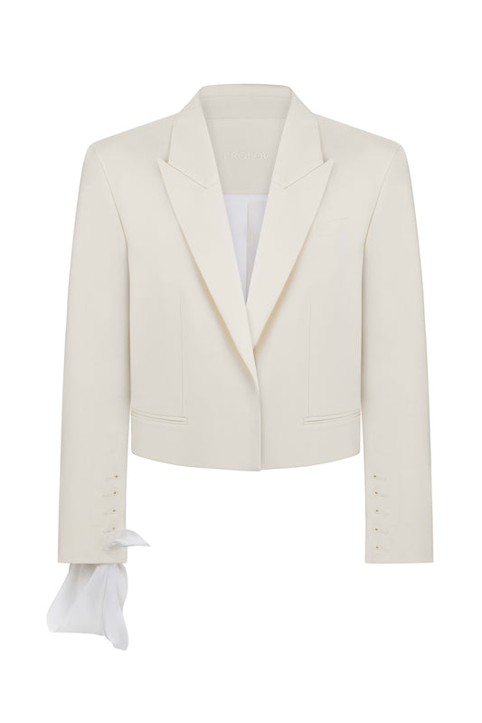 Jacket with skarf on the sleeve