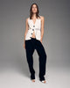 Sleeveless shirt with glass buttons