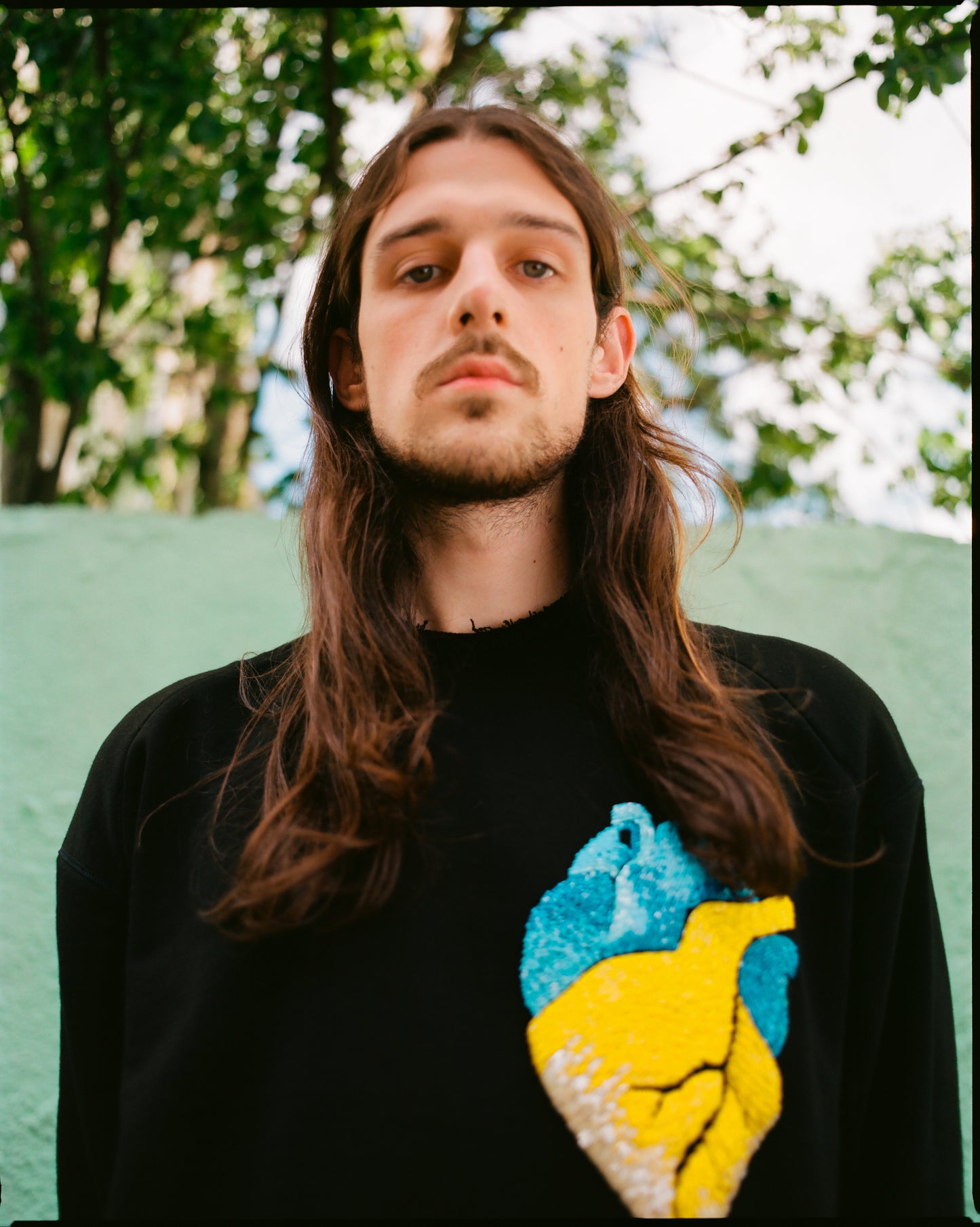 Black sweatshirt with handmade heart embroidery