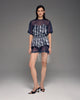 Silk printed shorts with fringe