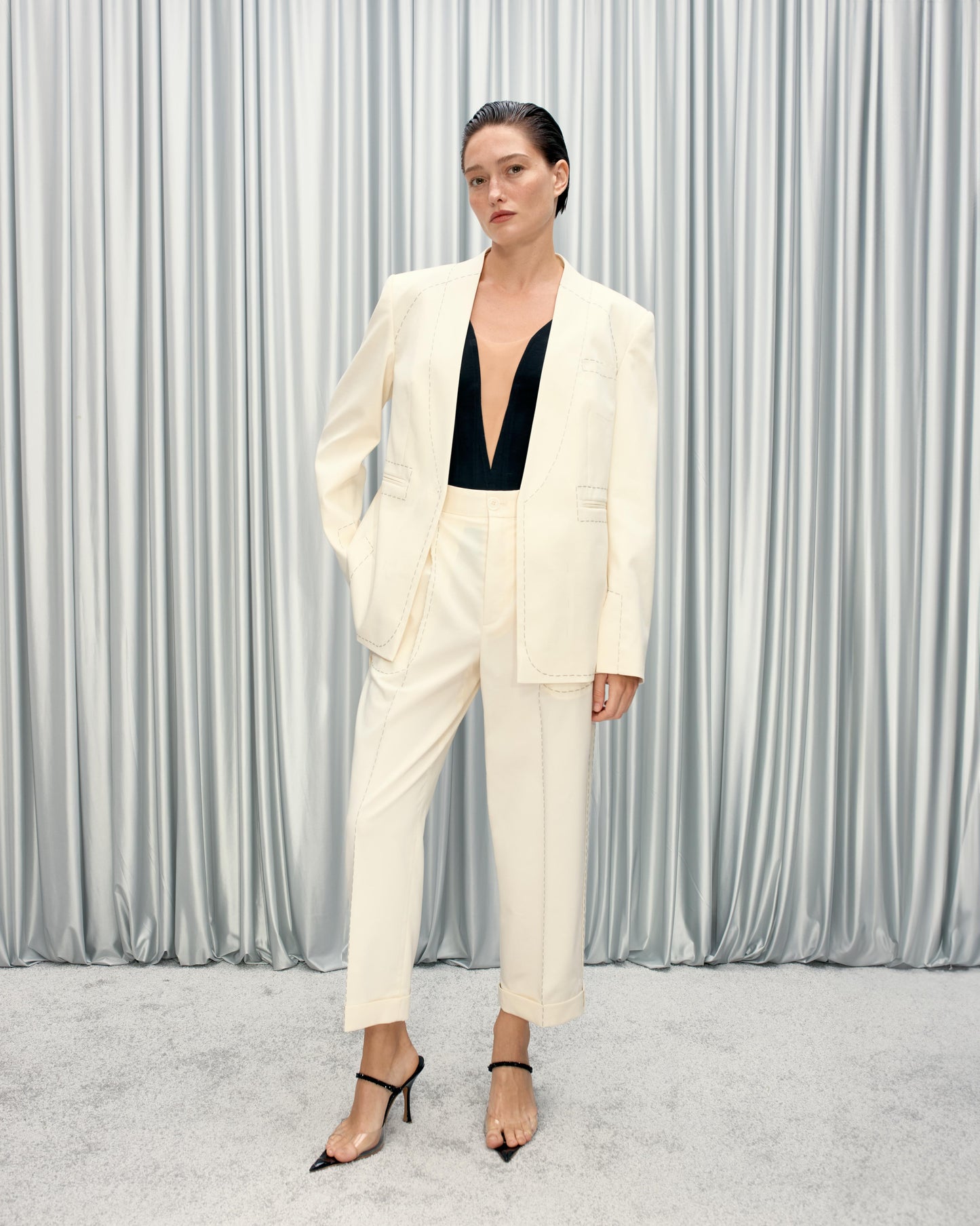 Stitched jacket with transparent pockets